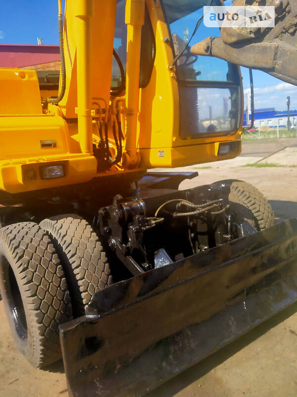 Колесный экскаватор Hyundai 140D 2006 в Сумах