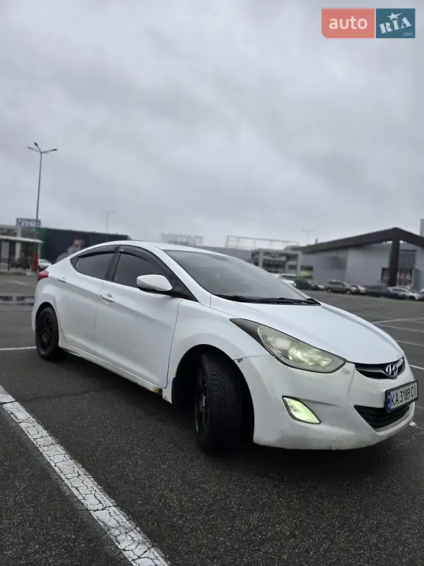 Hyundai Elantra 2012 VIN KMHDH4AE7CU493860 фото оголошення 31 з 64