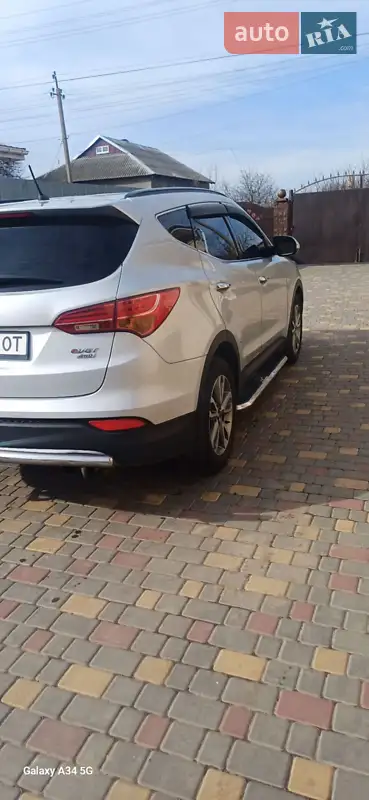 Hyundai Santa FE 2014 VIN KMHSW81UDFU329324 фото оголошення 12 з 53