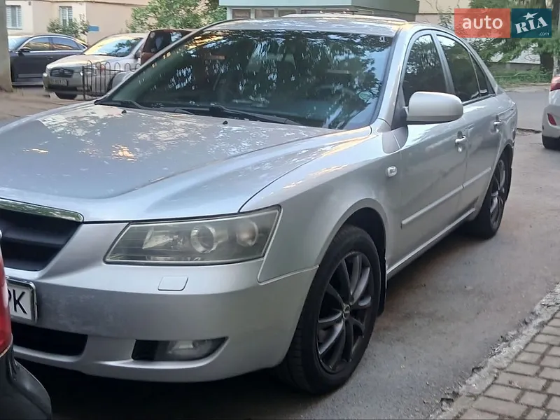 Hyundai Sonata 2004 VIN KMHEM41BP4A973646 фото оголошення 12 з 43