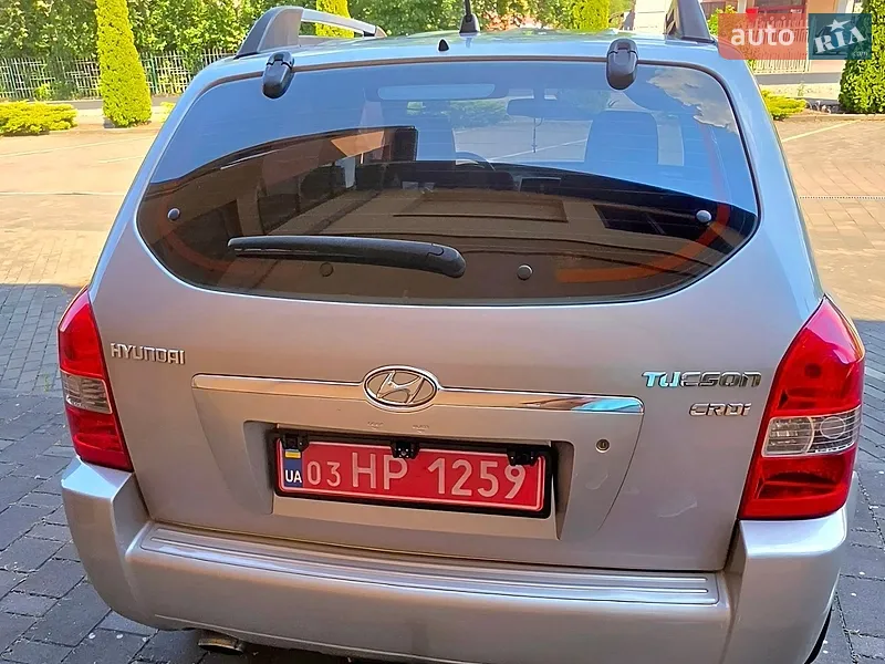 Hyundai Tucson 2005 VIN KMHJN81VP5U233596 фото оголошення 9 з 70