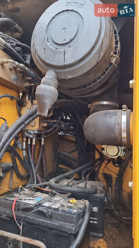 Колесный экскаватор JCB JS 200 2005 в Беляевке