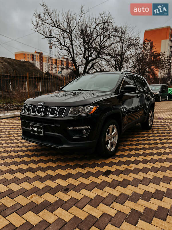2018 Jeep Compass, VIN 3C4NJDBB1KT593933:plate — photo 1 (autoria)