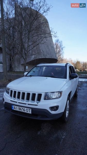 2014 Jeep Compass, VIN 1C4NJDAB7FD207416:plate — photo 1 (autoria)