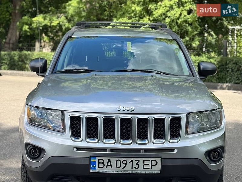 2016 Jeep Compass, VIN 1C4NJDBB1GD713680:plate — zdjęcie 1 (autoria)