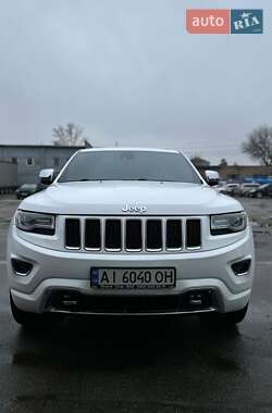 Внедорожник / Кроссовер Jeep Grand Cherokee 2013 в 