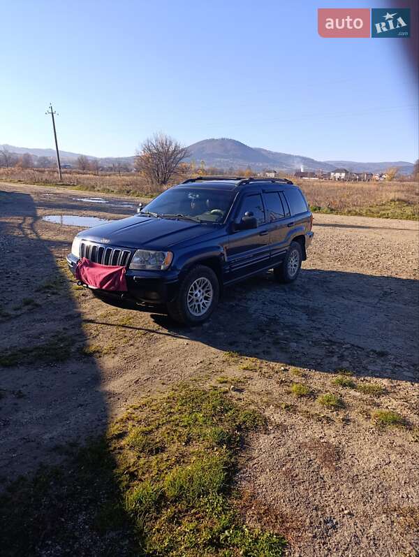 Внедорожник / Кроссовер Jeep Grand Cherokee 2003 в 