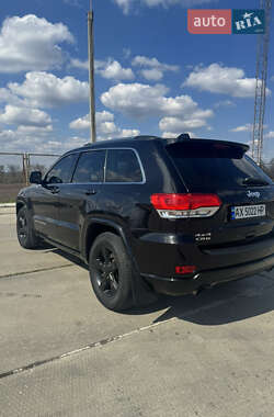 Внедорожник / Кроссовер Jeep Grand Cherokee 2013 в 