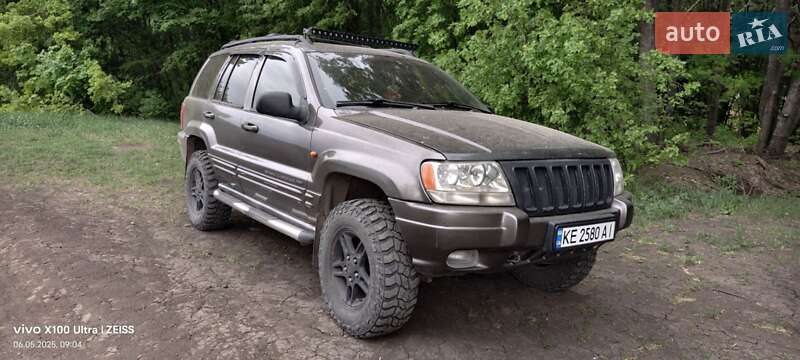 Внедорожник / Кроссовер Jeep Grand Cherokee 1999 в 