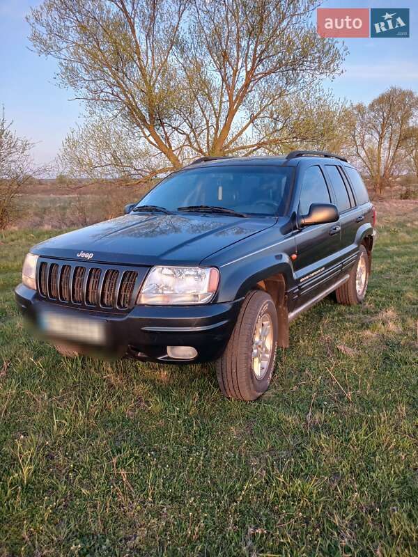 Внедорожник / Кроссовер Jeep Grand Cherokee 2000 в 