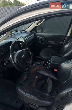 Внедорожник / Кроссовер Jeep Grand Cherokee 2003 в 