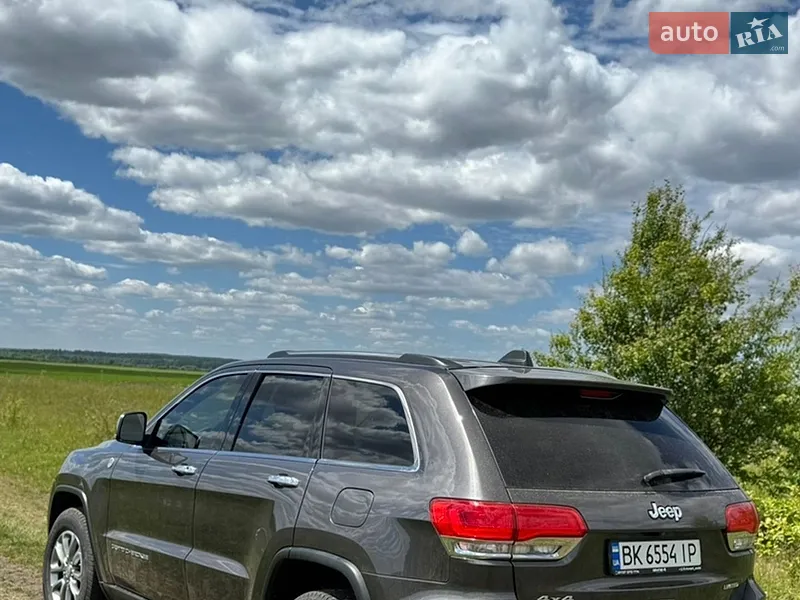 Jeep Grand Cherokee 2014 VIN 1C4RJFBM9EC399424 фото оголошення 3 з 57