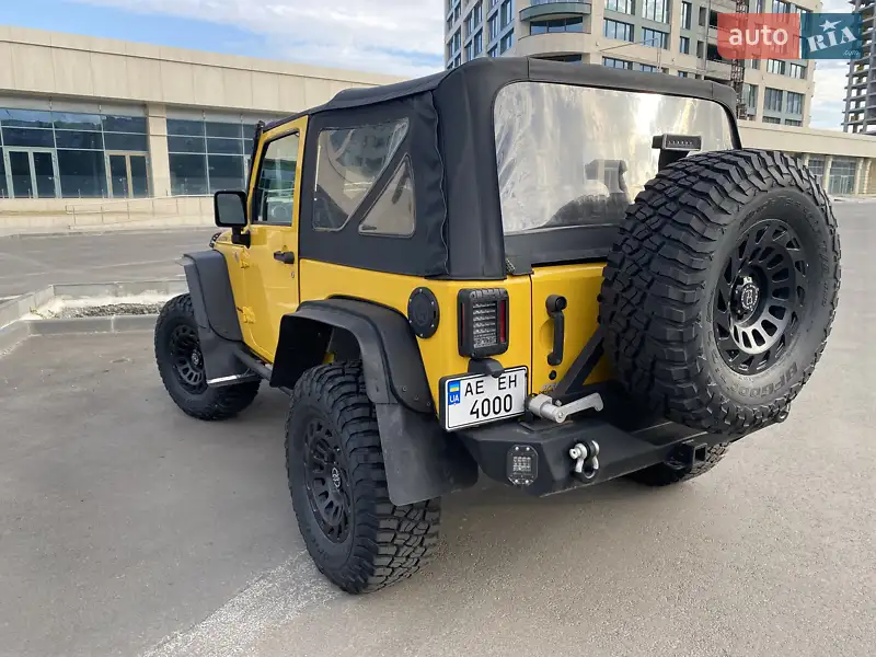 Jeep Wrangler 2015 VIN 1C4BJWCG5FL736361 фото оголошення 6 з 55