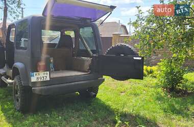 Внедорожник / Кроссовер Jeep Wrangler 1992 в 