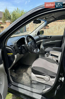 Минивэн Kia Carnival 2012 в 