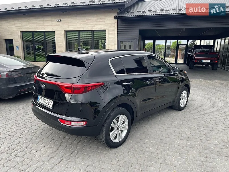 Kia Sportage 2016 VIN KNDPMCAC5H7087216 фото оголошення 4 з 61