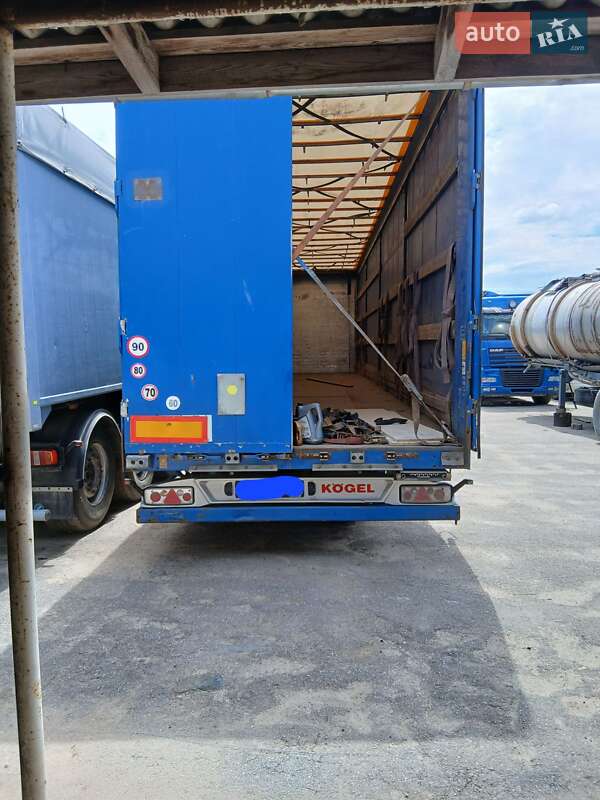 Тентований борт (штора) - напівпричіп Kogel SNCC 2009 в Городку