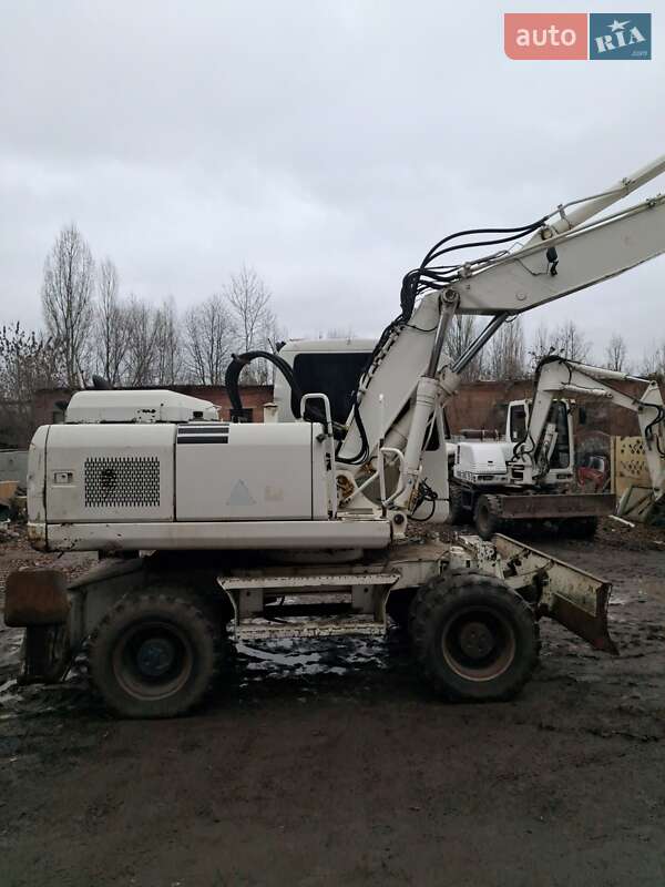 Колесный экскаватор Komatsu PW 2010 в Виннице
