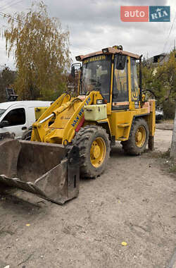 Экскаватор погрузчик Komatsu WB 2004 в Киеве