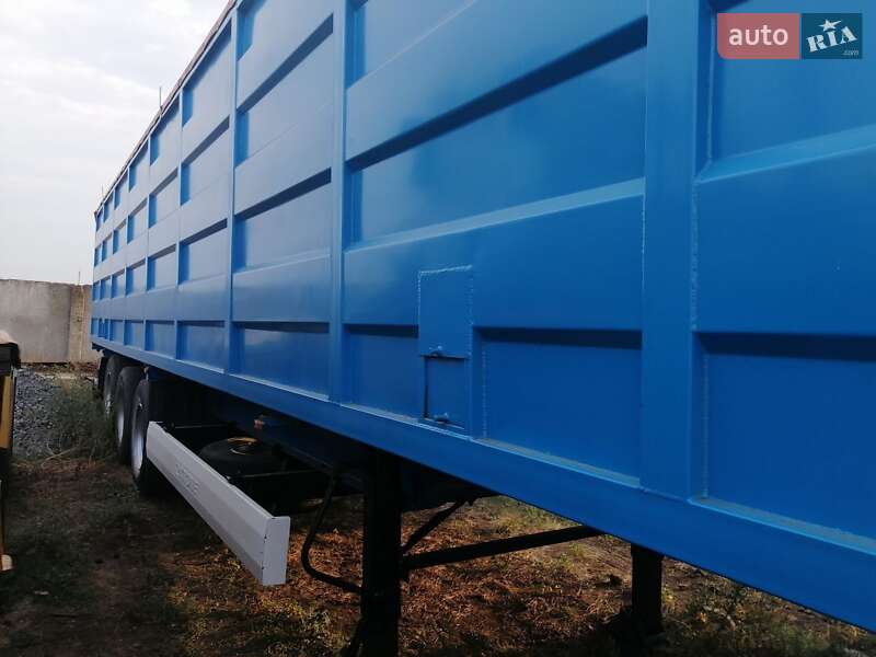 Бортовой полуприцеп Krone SD 27 2009 в Сарате