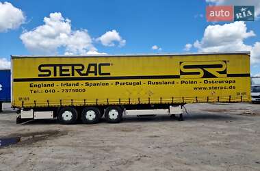 Бортовий напівпричіп Krone SD 2010 в 