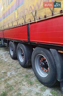 Бортовой полуприцеп Krone SDP 24 2006 в 