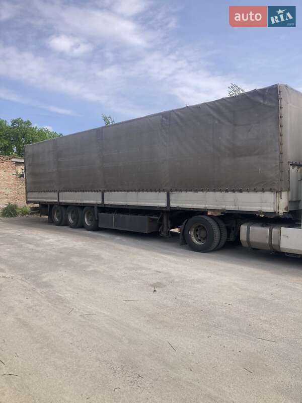 Бортовой полуприцеп Krone SDP 27 2001 в 
