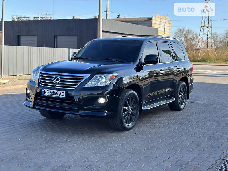 2011 Lexus LX, VIN JTJHY00W404070865:plate — фото 1 (autoria)