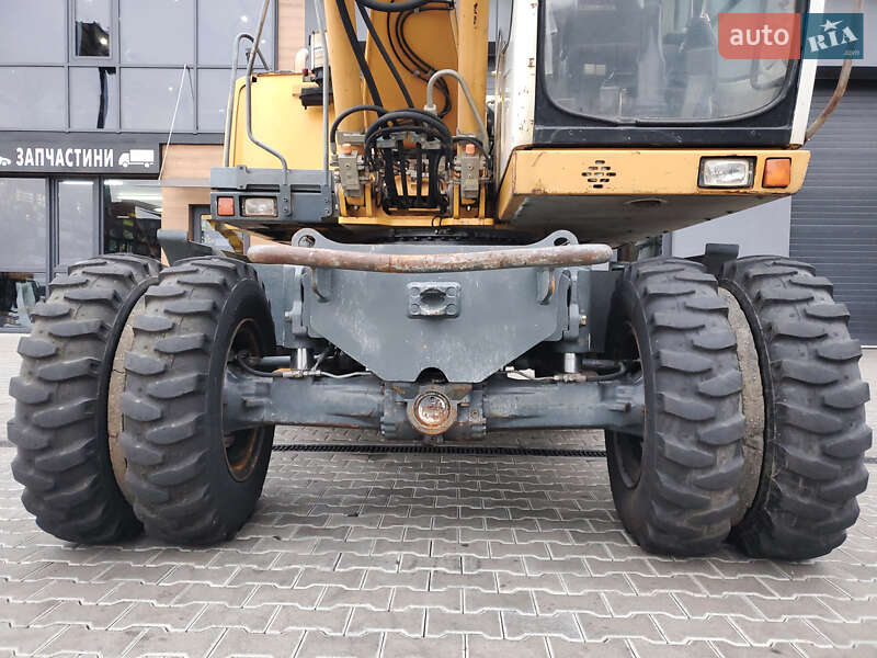 Колесный экскаватор Liebherr 312 2010 в Ровно