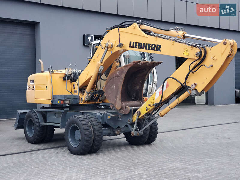 Колесный экскаватор Liebherr 312 2010 в Ровно