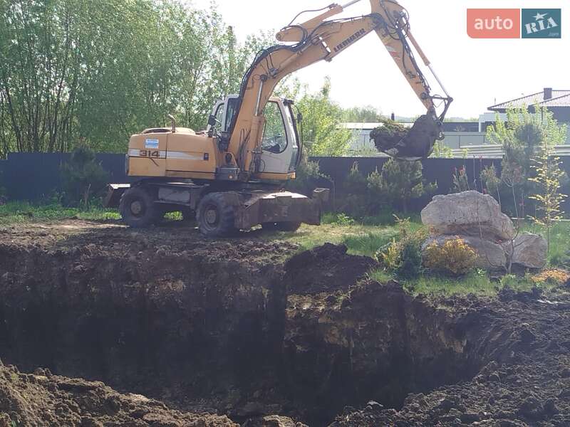 Колесный экскаватор Liebherr 314 2007 в Хмельницком