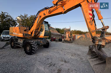 Колісний екскаватор Liebherr 900 Litronic 2010 в 