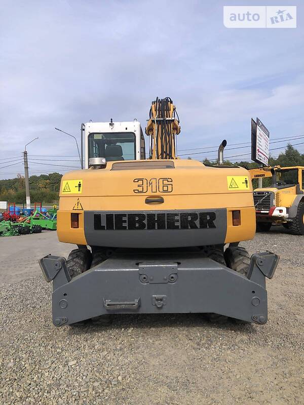 Колісний екскаватор Liebherr A 2011 в Львові