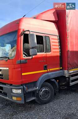 Тентованый MAN 12.220 2012 в Хмельницком