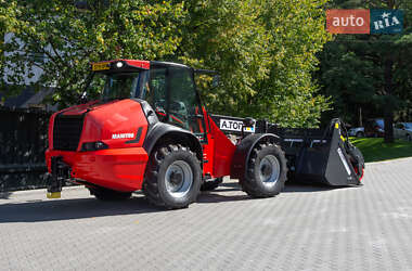 Телескопічні навантажувачі Manitou MLA 2018 в 