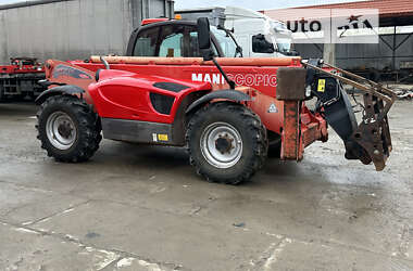 Телескопічні навантажувачі Manitou МТ 1435 2011 в 