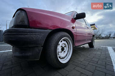 Хэтчбек Mazda 121 1988 в 
