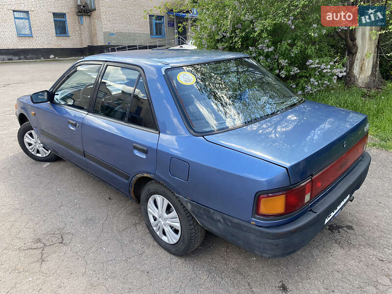 Седан Mazda 323 1990 в Днепре