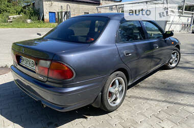 Седан Mazda 323 1998 в Кролевці