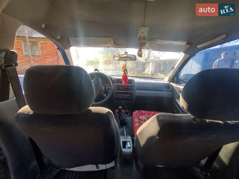 Седан Mazda 323 1997 в Христинівці фото 6 Седан Mazda 323 1997 в Христинівці