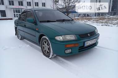 Седан Mazda 323 1996 в 