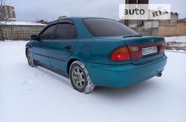 Седан Mazda 323 1996 в 