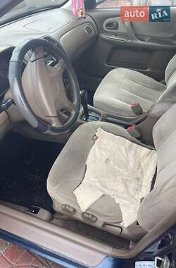 Седан Mazda 323 1999 в 