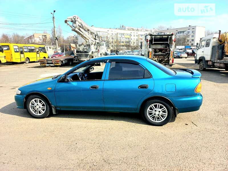 Седан Mazda 323 1998 в Одесі фото 4 Седан Mazda 323 1998 в Одесі