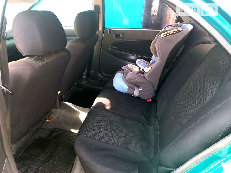 Седан Mazda 323 1998 в Одесі фото 18 Седан Mazda 323 1998 в Одесі