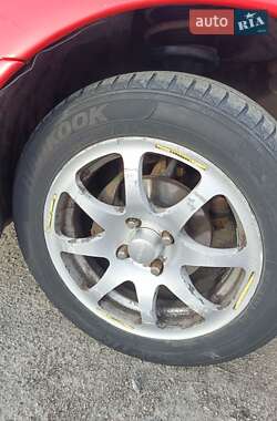 Хэтчбек Mazda 323 1994 в 