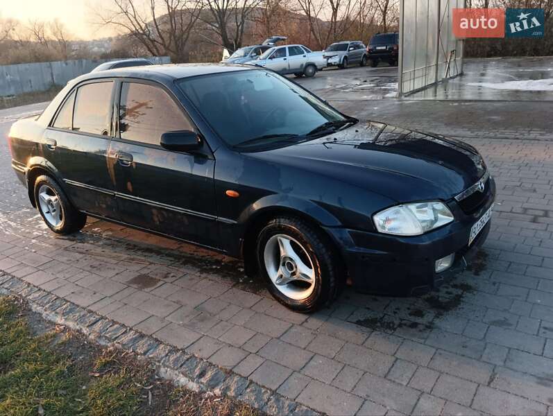 Седан Mazda 323 1998 в Бережанах