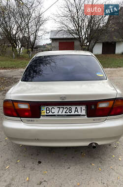 Седан Mazda 323 1996 в Буске