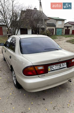 Седан Mazda 323 1996 в Буске