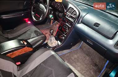 Хетчбек Mazda 323 1995 в 